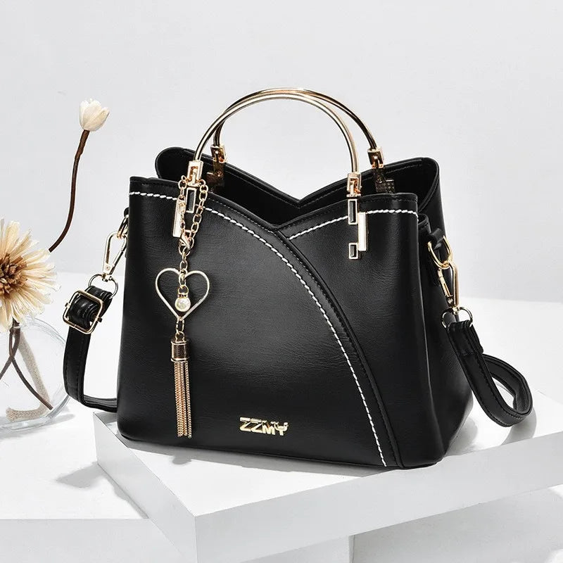 Europäische und amerikanische Trendhandtaschen Modefarbabstimmung koreanische Version kontrastierende Farben große Kapazität Damentaschen Mode
