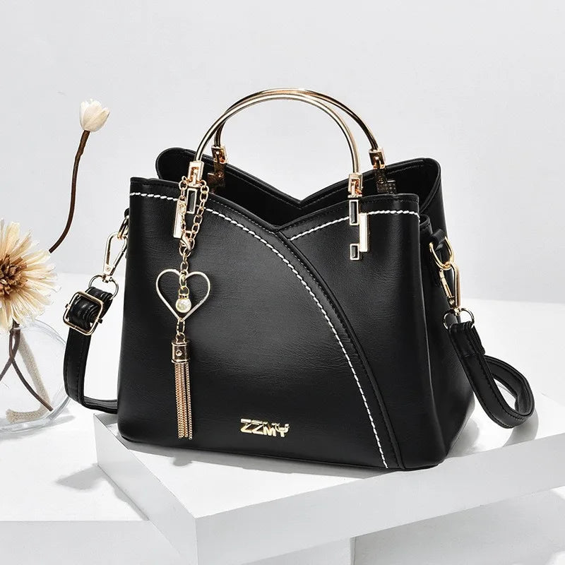 Europäische und amerikanische Trendhandtaschen Modefarbabstimmung koreanische Version kontrastierende Farben große Kapazität Damentaschen Mode